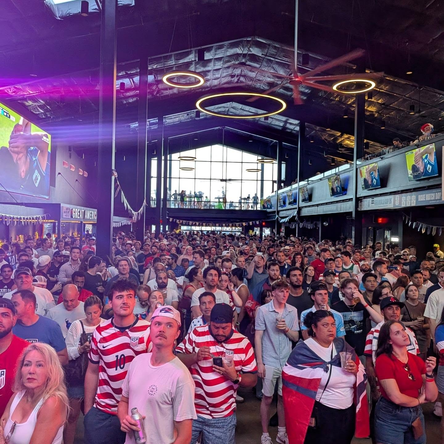 A soccer watch party fills the hall