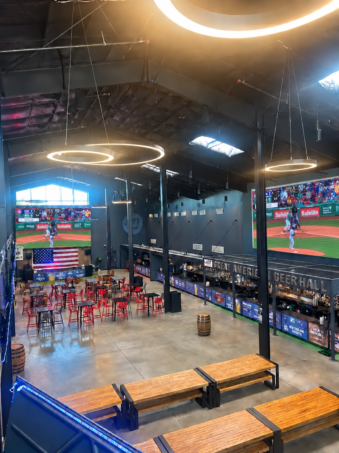 Red Sox baseball on the giant screens inside Great American Beer Hall in Medford